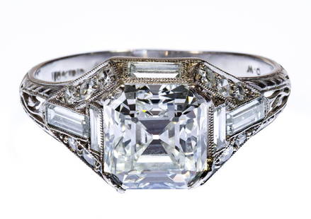 Platinum and Diamond Ring: Platinum and Diamond Ring Having an asscher cut center diamond weighing approximately 2.96CT, color I-J, clarity VS-1 adorned by baguette and round cut diamonds weighing approximately 1.11CTtw; marked