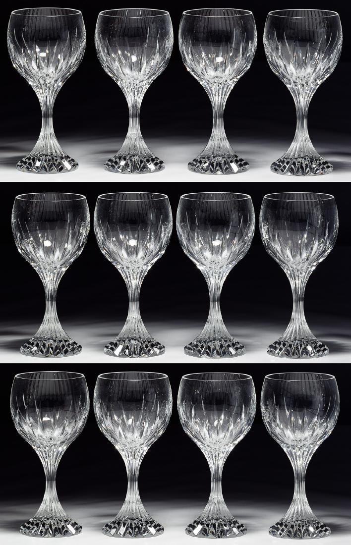 Baccarat 'Massena (No Trim)' White Wine Glass: Baccarat 'Massena (No Trim)' White Wine Glass Collection Twelve white wine glasses, deep beveled cuts creating a prismatic effect, etched 'Baccarat' on the underside, including storage box Condition: 
