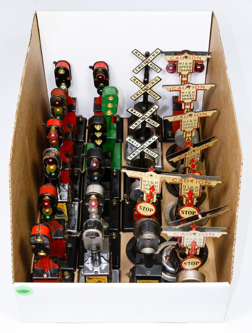 Marx Model Train Signal Light Assortment: Marx Model Train Signal Light Assortment Fifty items including crossing, caution, stop lights, flood lights and a watchtower; from the Estate of Peter Quinn Condition: Good to Fair, light to moderate