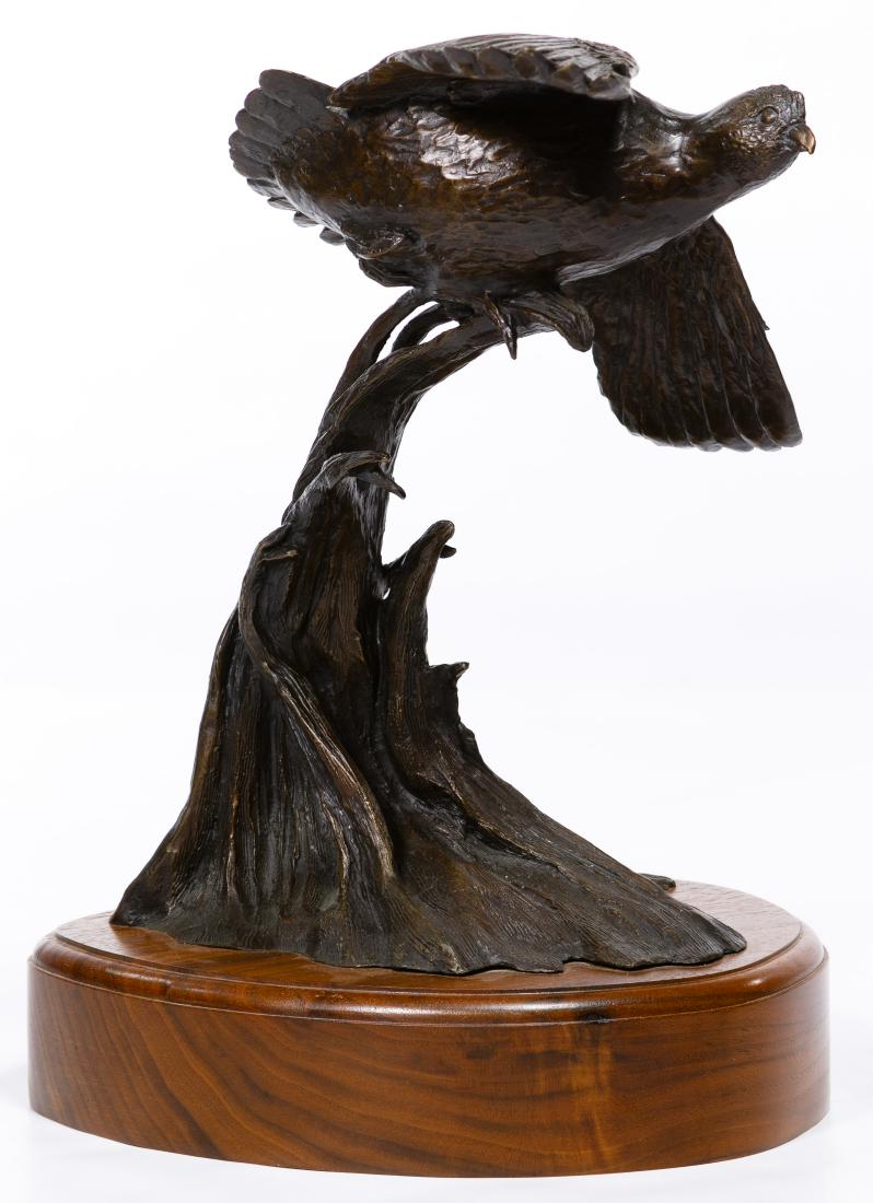 Cody Houston (American, b.1941) Bronze Statue: Cody Houston (American, b.1941) Bronze Statue 2004, signed en verso, numbered 2/35, depicting a partridge in flight; wood base Condition: Very Good, overall light wear consistent with age and normal u
