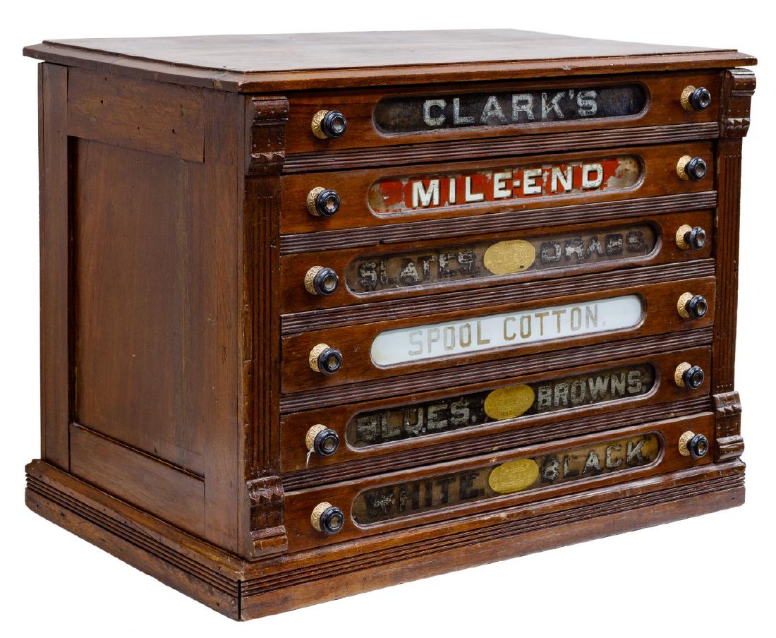 Eastlake Style Clark's Spool Cabinet: Eastlake Style Clark's Spool Cabinet c.1890, walnut cabinet having Eastlake style details, six drawers with original glass fronts and hardware Condition: Fair, paint loss to labels reverse painted on 