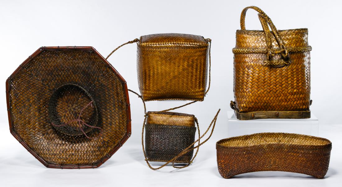 Filipino Woven Basket Assortment: Filipino Woven Basket Assortment Four woven bamboo baskets; together with a bamboo woven field hat Condition: Very Good, overall light to moderate wear; light caning loss at top side of tall double to