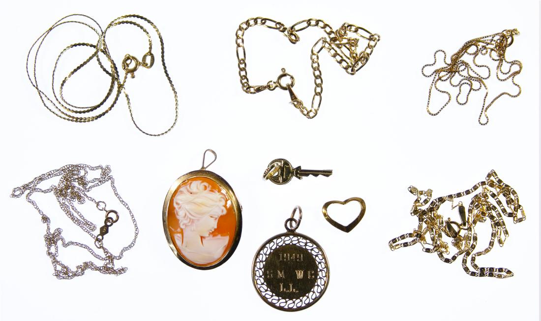 14k Gold Jewelry Assortment: 14k Gold Jewelry Assortment Eight items including four chain necklaces, a chain bracelet, a signed carved shell cameo pendant, a small key pendant and a small open heart pendant; most marked '14k'; to