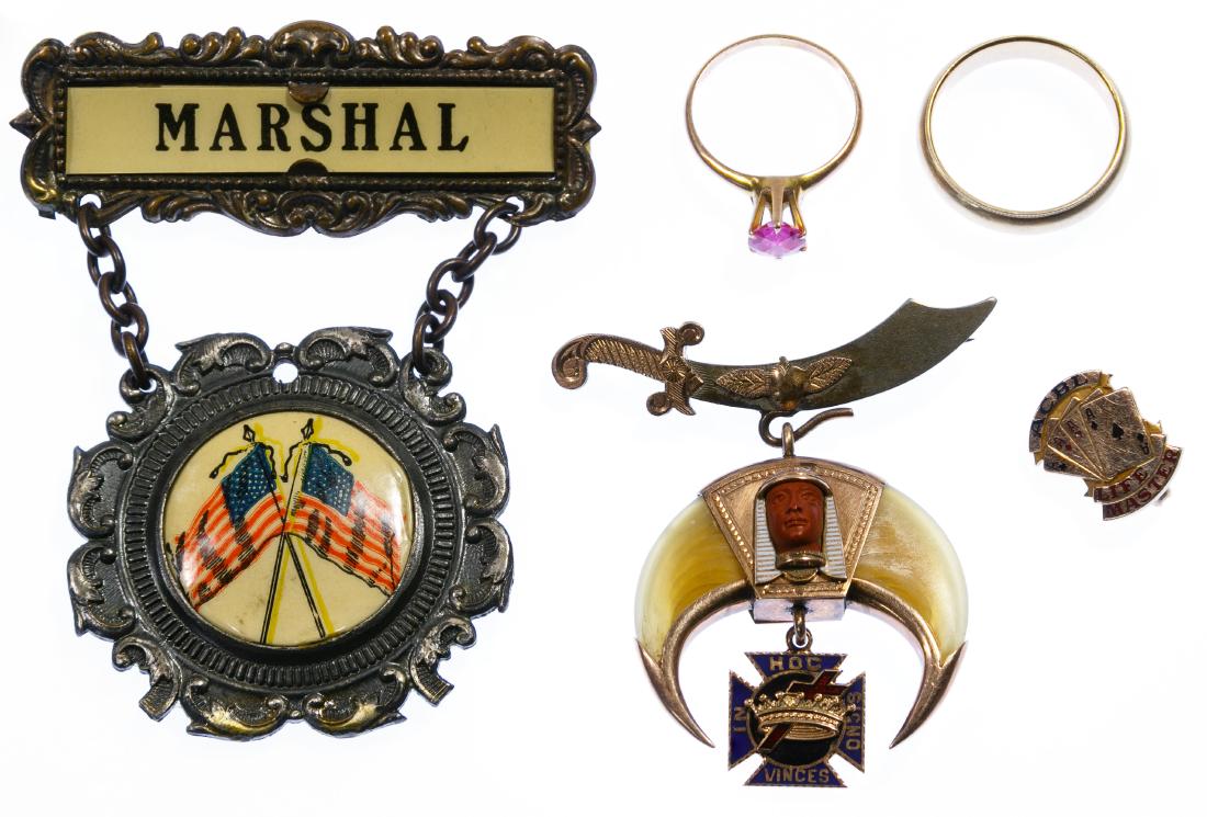 10k Gold Jewelry Assortment: 10k Gold Jewelry Assortment Including a band ring; a pink ruby ring; an 'ACBL Life Master' pin and a 'Masonic Past Potentate' pin having tiger claws; rings and Master pin marked '10k'; together with a