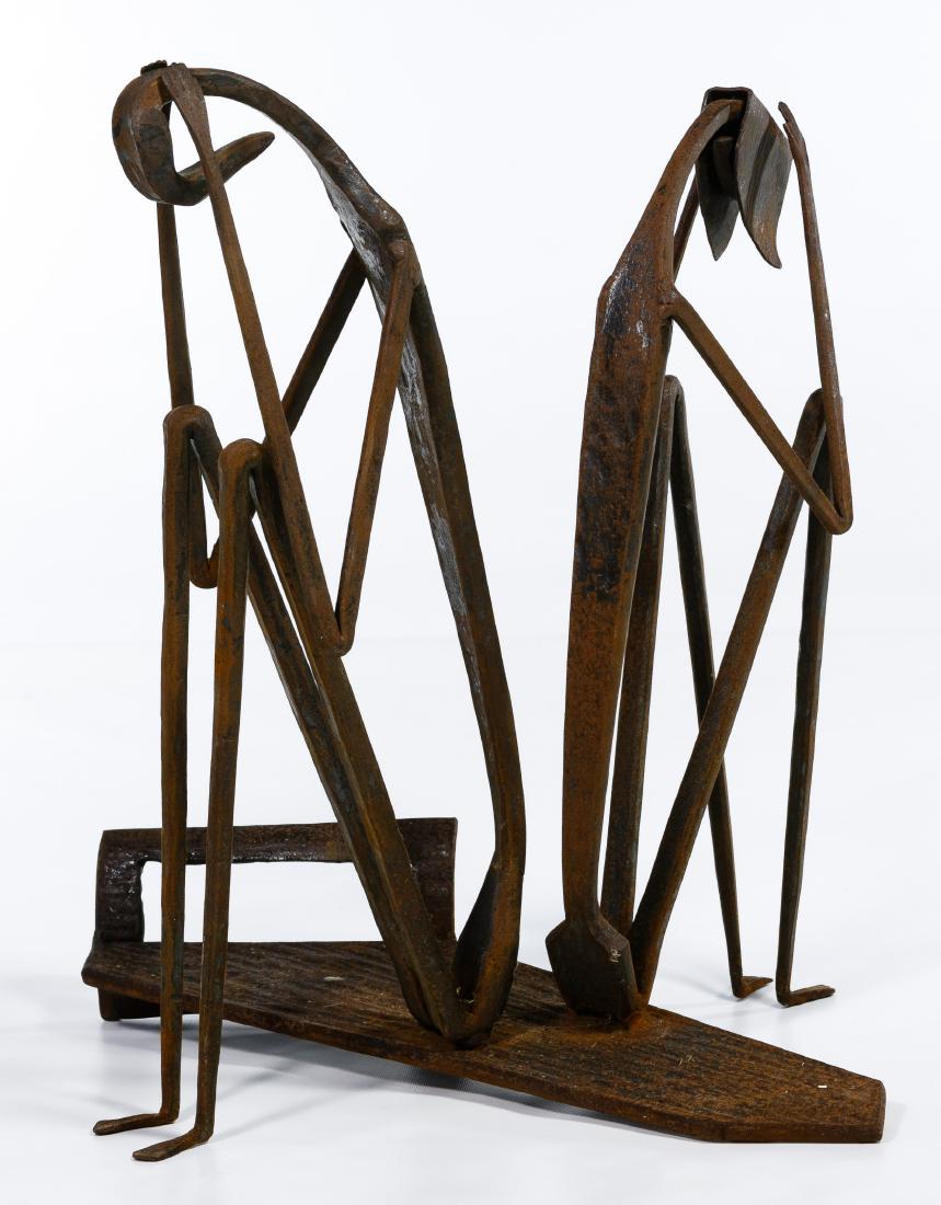 Erwin Gruen (American, 1918-2006) Iron Statue: Erwin Gruen (American, 1918-2006) Iron Statue Undated, signed on the long side of the bottom platform; depicting a couple sitting back to back, heads in hands Condition: Good, rust, dust, age and wear