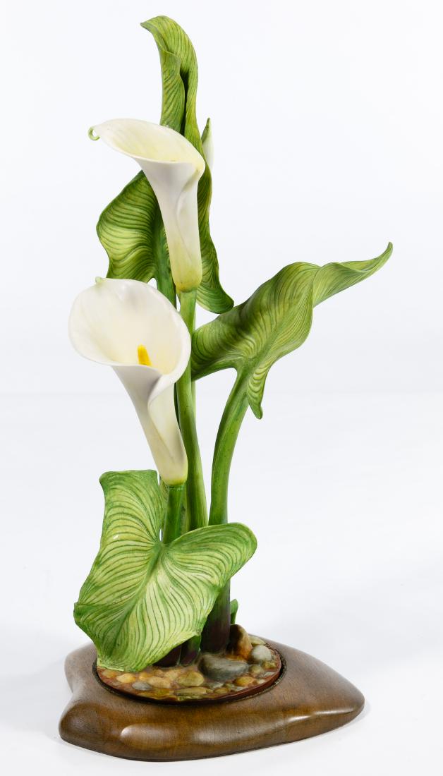 Cybis 'Calla Lily' Porcelain Figurine: Cybis 'Calla Lily' Porcelain Figurine 1968, signed on stem #127; together with wood base Condition: Very Good, no chips or cracks noted Height: 16.25 inches, Length: 7.00 inches, Width: 6.00 inches (i