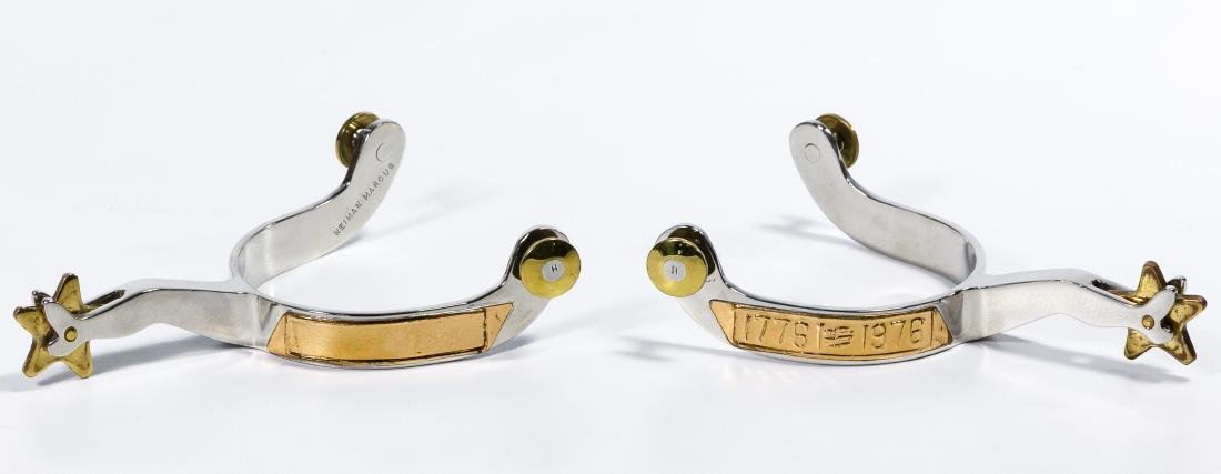 Bicentennial Rodeo Presentation Spurs: Bicentennial Rodeo Presentation Spurs 1976, two-tone metal spurs having embossed plate of '1776-1976', both marked 'Neiman Marcus', stored in lined wood box Condition: Good, light wear from storage; v