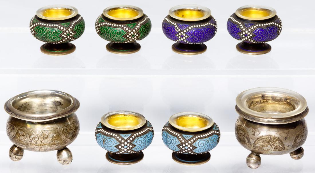 European Silver Salt Cellars: European Silver Salt Cellars Eight footed salt cellars having glass inserts with six also having enamel decoration; marked 'sterling', '930' or '84' for Russian 875 silver Condition: Very Good, overal
