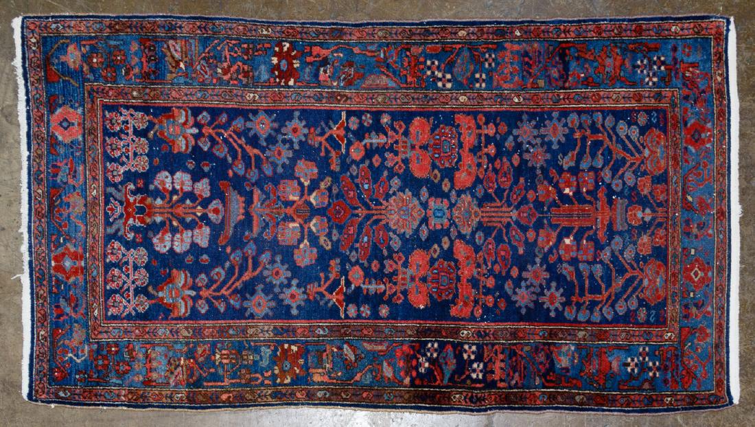 Persian Wool Rugs: Persian Wool Rugs Three items including a geometric repeating design in shades of red, cream and blue, a floral sprays pattern in rust and blues and a smaller rug in shades of blue and coral Condition