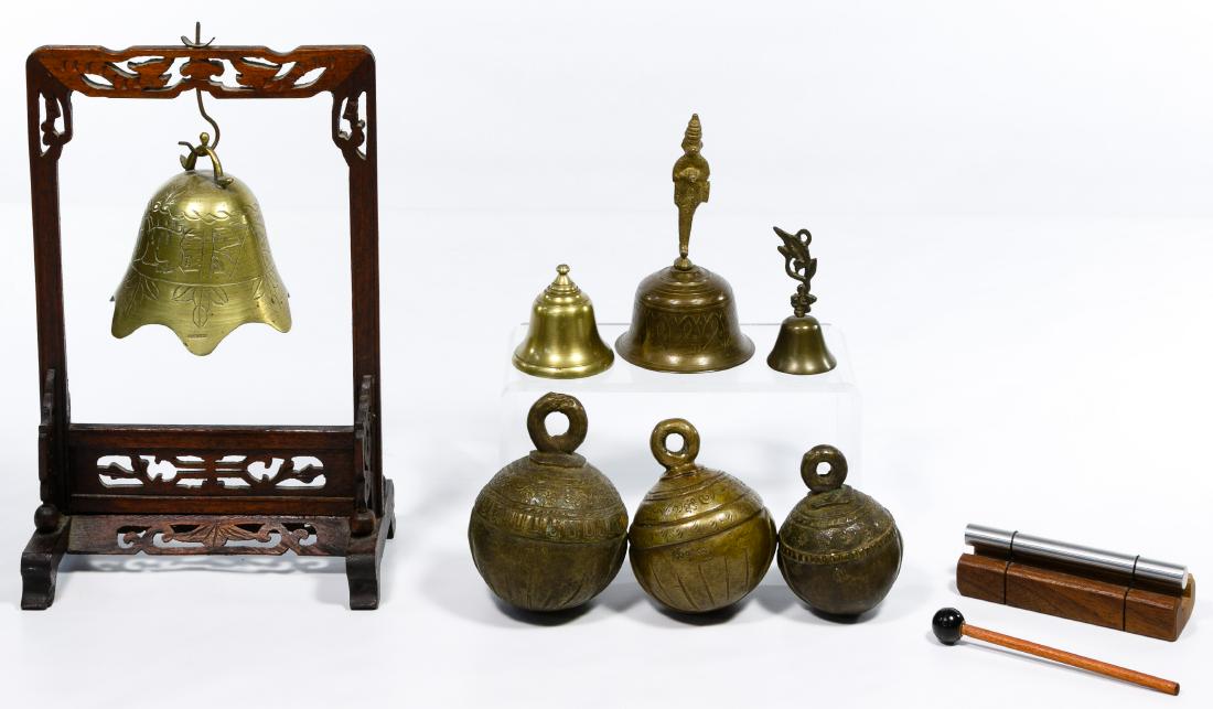 Brass Bell Assortment: Brass Bell Assortment Nine items including four bells, three 'Tibetan' style bells, a meditation chime and mallet signed 'JW Stannard' and a stand Condition: Good, overall light wear consistent with a
