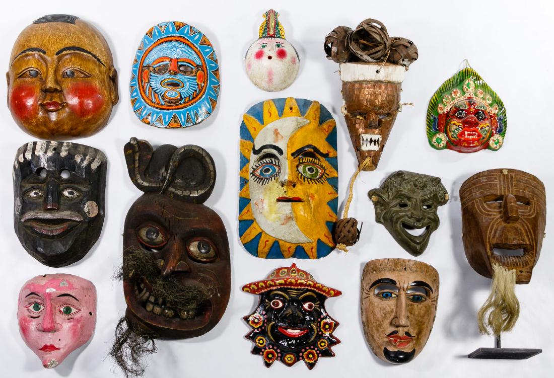 Mask Assortment: Mask Assortment Thirty-six masks including a mask having painted ceramic eyes, a mask on a stand, a textile mask, a skull mask and four sun masks, materials including wood, papier mache, ceramic, gour