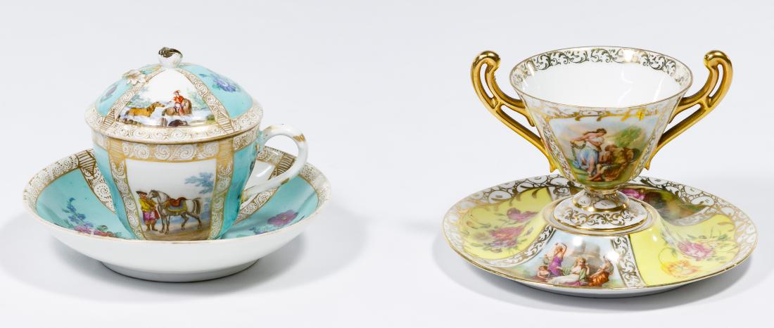 Austrian Cup and Saucer Sets: Austrian Cup and Saucer Sets Two sets including a yellow set painted with flowers, Cupid, Venus and Roman figures as well as a turquoise blue set painted with flowers, horses and riders; blue markings