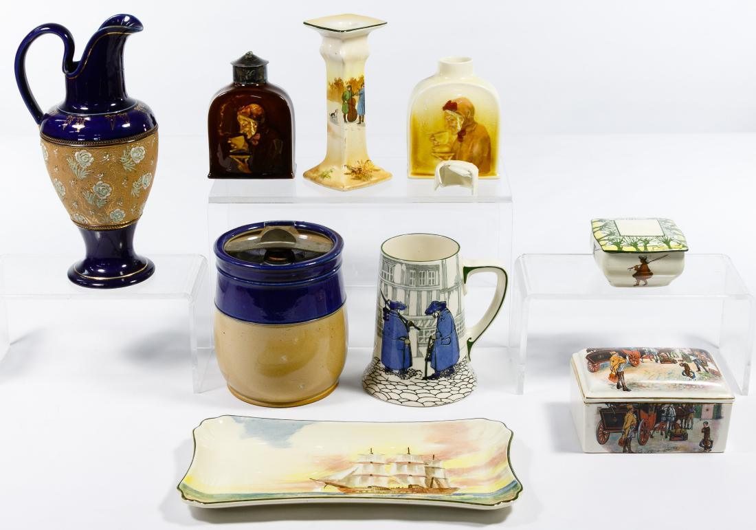 Royal Doulton Humidor, Mug and Pitcher Assortment: Royal Doulton Humidor, Mug and Pitcher Assortment Sixteen items including two humidors, three pitchers, two trivets, a mug, two lidded jars, a candlestick, trinket box, trinket platter, all marked 'Ro