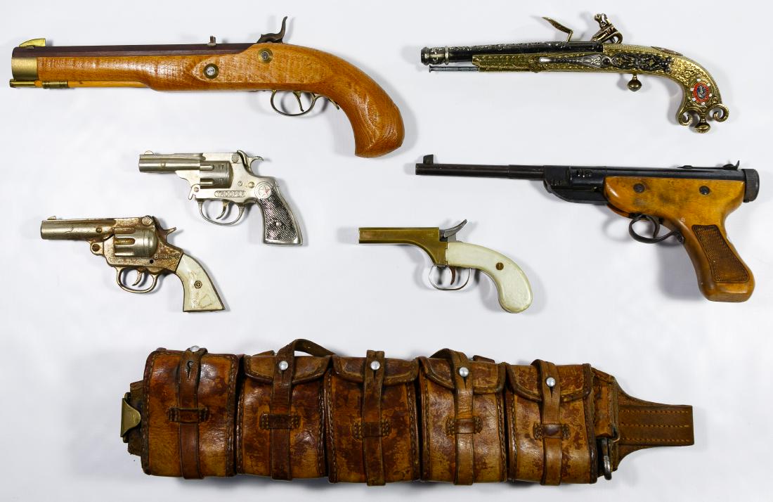 Replica Gun, Starter Pistol and Cap Gun Assortment: Replica Gun, Starter Pistol and Cap Gun Assortment Including a Diana air gun Luger replica, a Denix replica flintlock pistol, an unmarked two barreled starter gun, an unmarked replica dueling pistol a