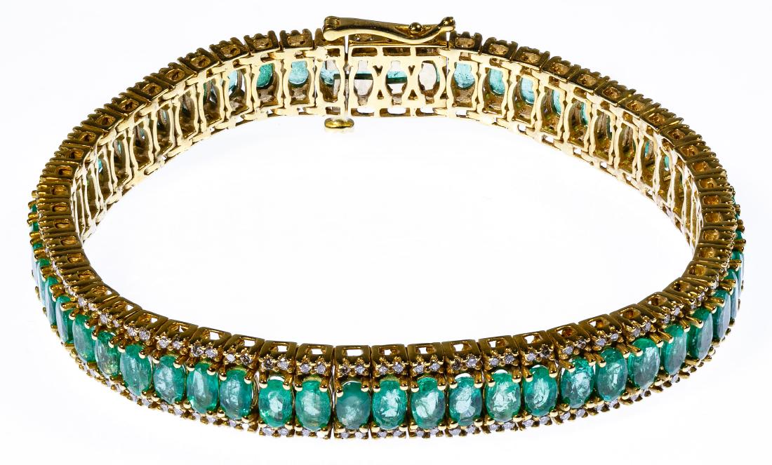 18k Gold, Emerald and Diamond Bracelet: 18k Gold, Emerald and Diamond Bracelet Having fifty-seven oval cut emeralds flanked by a total of two hundred twenty-eight diamond chips; marked '18k' on clasp; together with storage box Condition: Ve