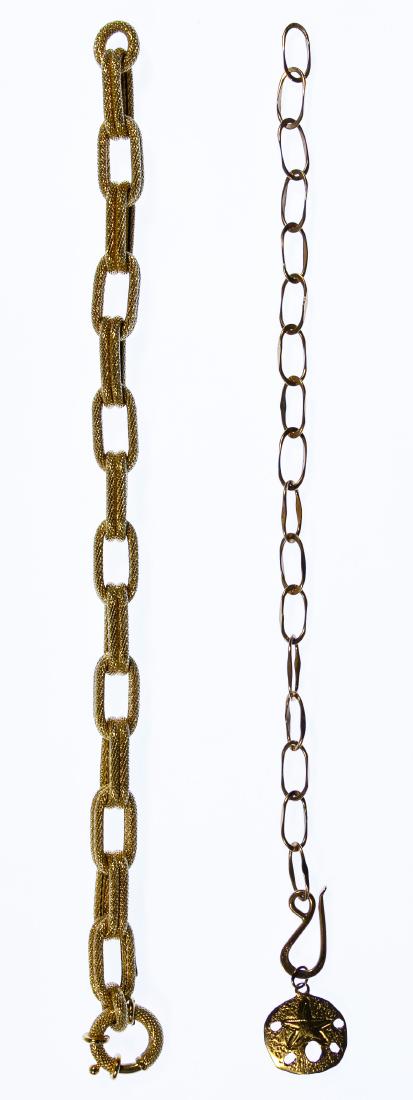14k Gold Link Bracelets: 14k Gold Link Bracelets Two bracelets including one having a 14k gold charm; all marked '14k' Condition: Very Good, light wear Length: 8.00 inches Weight: 10.42 dwts. (total weight) Category: Fine Jew