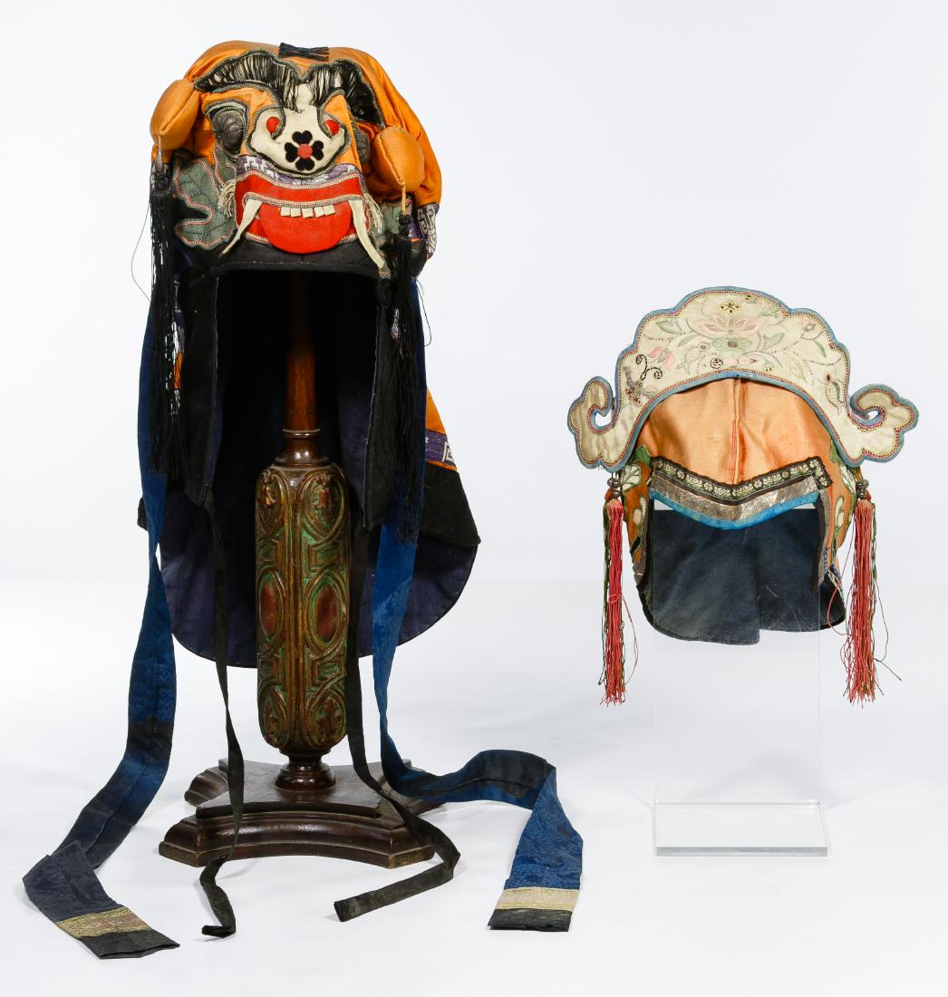 Wood Hat Stand: Wood Hat Stand Wood hat stand carved on lower half, with remnants of green paint; together with two silk hats including a flower crown style and a lion style Condition: Good, overall wear consistent w