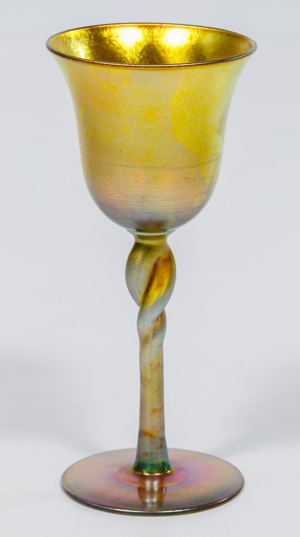 Steuben Aurene Kiddush Cup: Steuben Aurene Kiddush Cup Aurene glass cup, flared bowl on twisted stem Condition: Very Good, very slight wear below bowl; no chips or cracks noted Height: 6.25 inches, Diameter: 2.75 inches Category