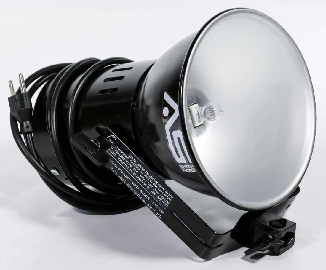 Smith Victor 144G Photography Lights and Case: Smith Victor 144G Photography Lights and Case Three lights; together with extra light bulbs and black hard shell case Condition: Very Good, working; we cannot guarantee the longevity; light wear on ca