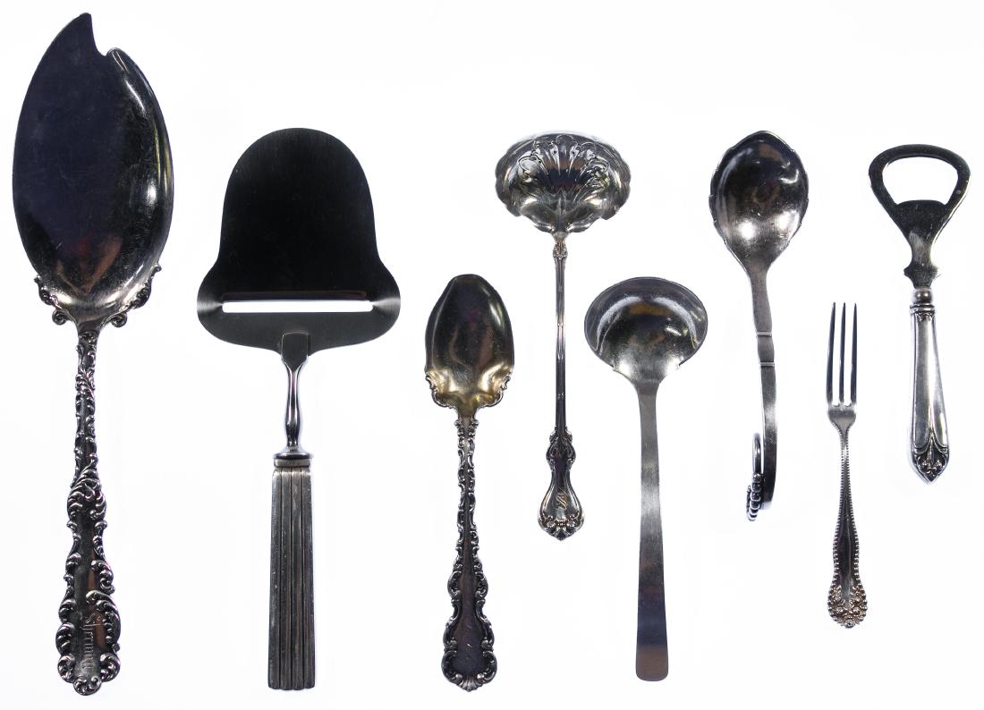 Georg Jensen Sterling Silver Serving Pieces: Georg Jensen Sterling Silver Serving Pieces Two items including a jelly spoon and cheese plane, marked 'Georg Jensen'; together with six serving pieces including spoons, forks and bottle opener; all m