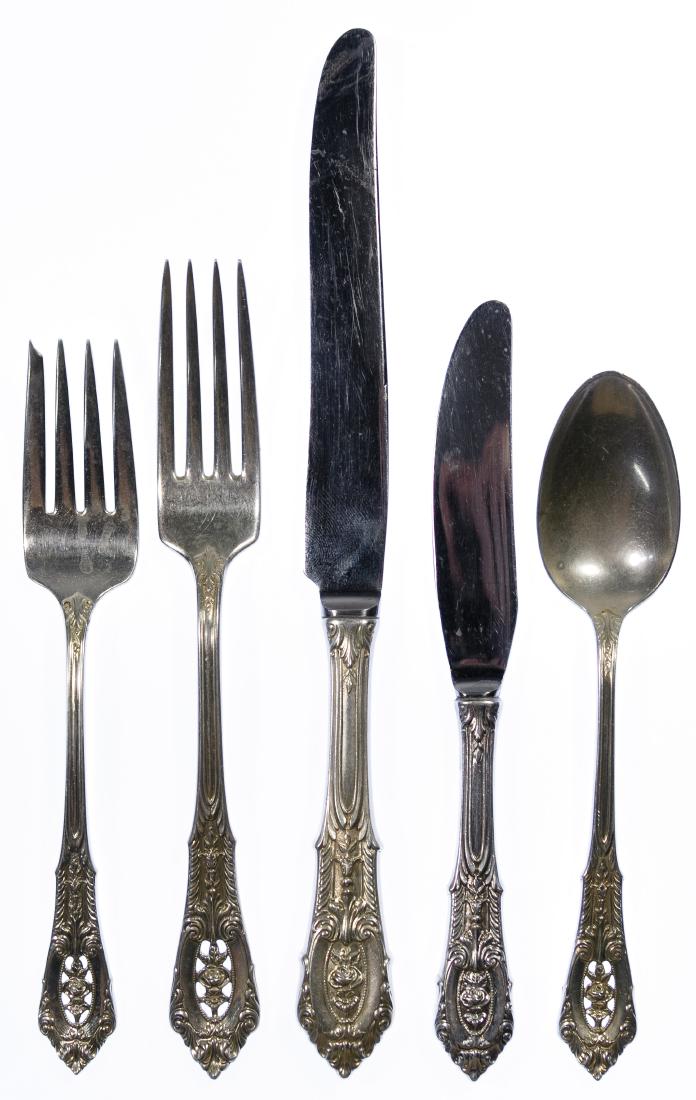 Wallace 'Rose Point' Sterling Silver Flatware Service: Wallace 'Rose Point' Sterling Silver Flatware Service Including (12) dinner knives, (11) individual butter knives, (12) dinner forks, (11) salad forks, (12) teaspoons, (4) serving spoons, pie server, 