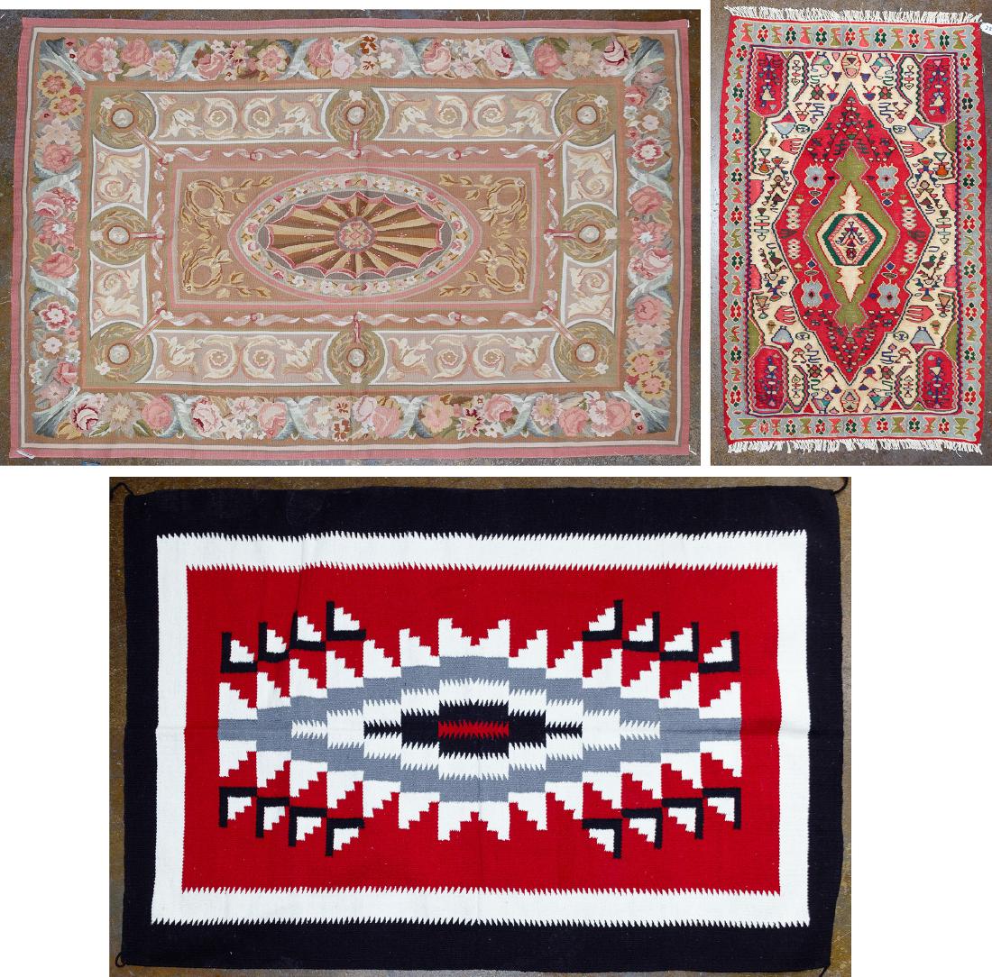 Wool Rug, Needlepoint and Blanket: Wool Rug, Needlepoint and Blanket Three rugs including an Aubusson style needlepoint having neoclassic motifs in gold, peach, celadon, brown and cream; a flat weave tribal-style prayer rug having bird