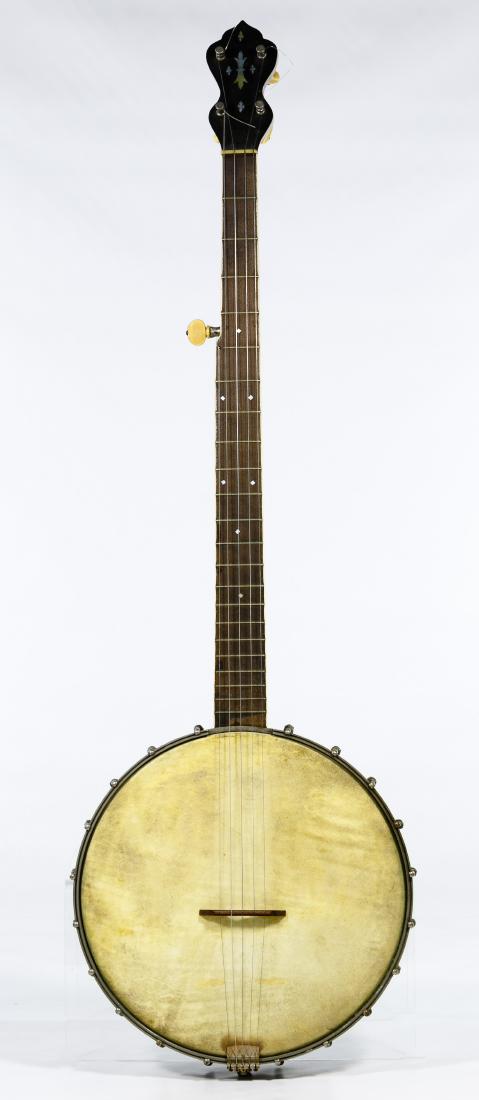Slingerland Wood Banjo: Slingerland Wood Banjo c.1930, stamped maker mark en verso, having five strings, tail piece by Bell Brand and mother of pearl inlay at top Condition: Very Good, minor damage to the inlay on the sides 