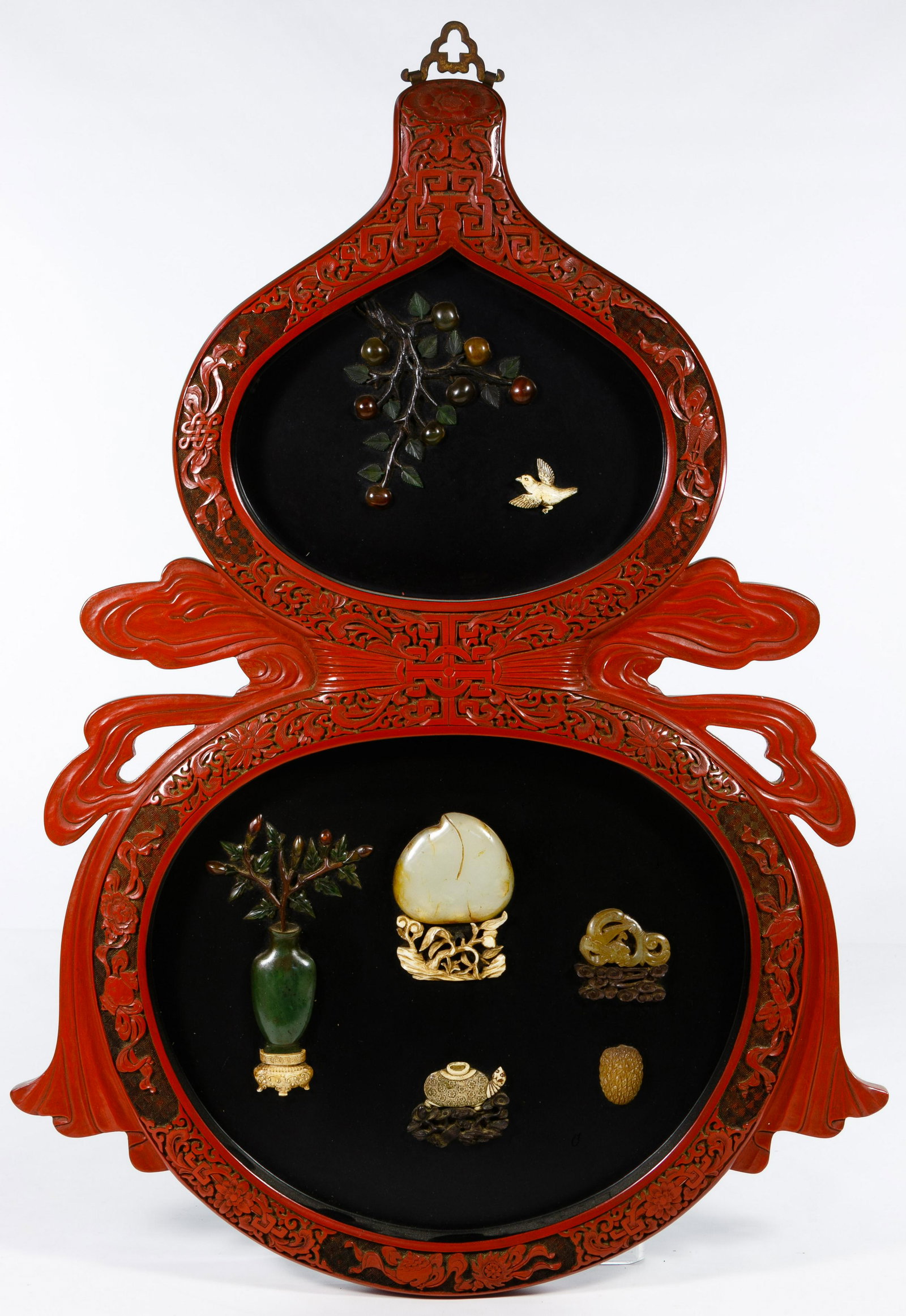 Asian Cinnabar and Hardstone Wall Plaque: Asian Cinnabar and Hardstone Wall Plaque Double gourd shape having applied stone decorations made of quartz and bone Condition: Very Good, overall light wear consistent with age and normal use; no chi