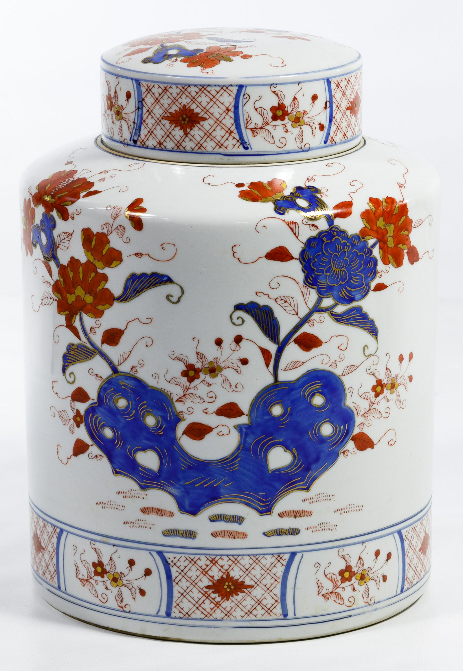 Asian Ginger Jar: Asian Ginger Jar 20th Century, having a floral motif with lid, in rust, blue and gold Condition: Good, overall light wear consistent with age and normal use; no chips or cracks noted Length: 12.00 inc