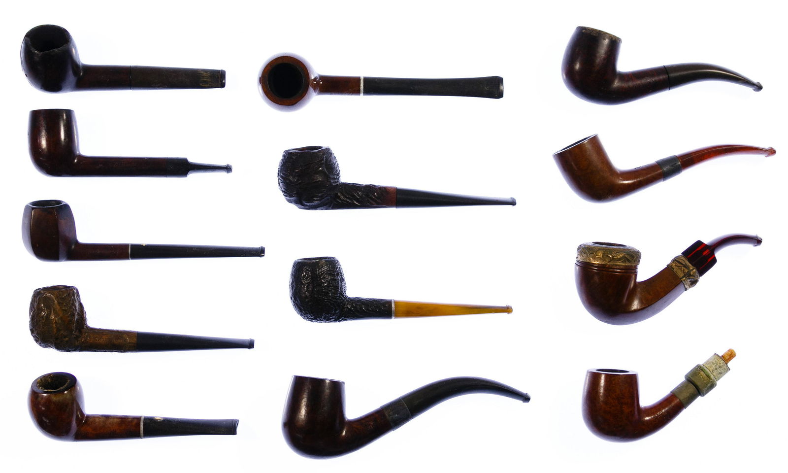 Smoking Pipe Assortment: Smoking Pipe Assortment Thirteen items with examples from Kaywoodie, Real Amber, Linkman's, Dunhill, Salerno, Bentley, Shoreham, Lord Biltmore and Masterpiece Condition: Very Good to Good, overall lig