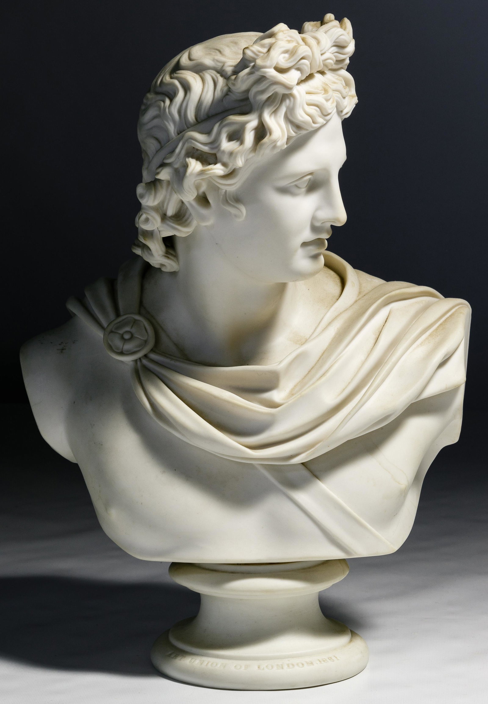 (After) C Delpech (French, 19th Century): (After) C Delpech (French, 19th Century) 'Apollo' Parian Bust 1861, modeled after Pierre Charles-Eugene Delpech, Brown-Weshead, Moore & Co Art Union of London Parian bust of Apollo, base impressed 'Ar