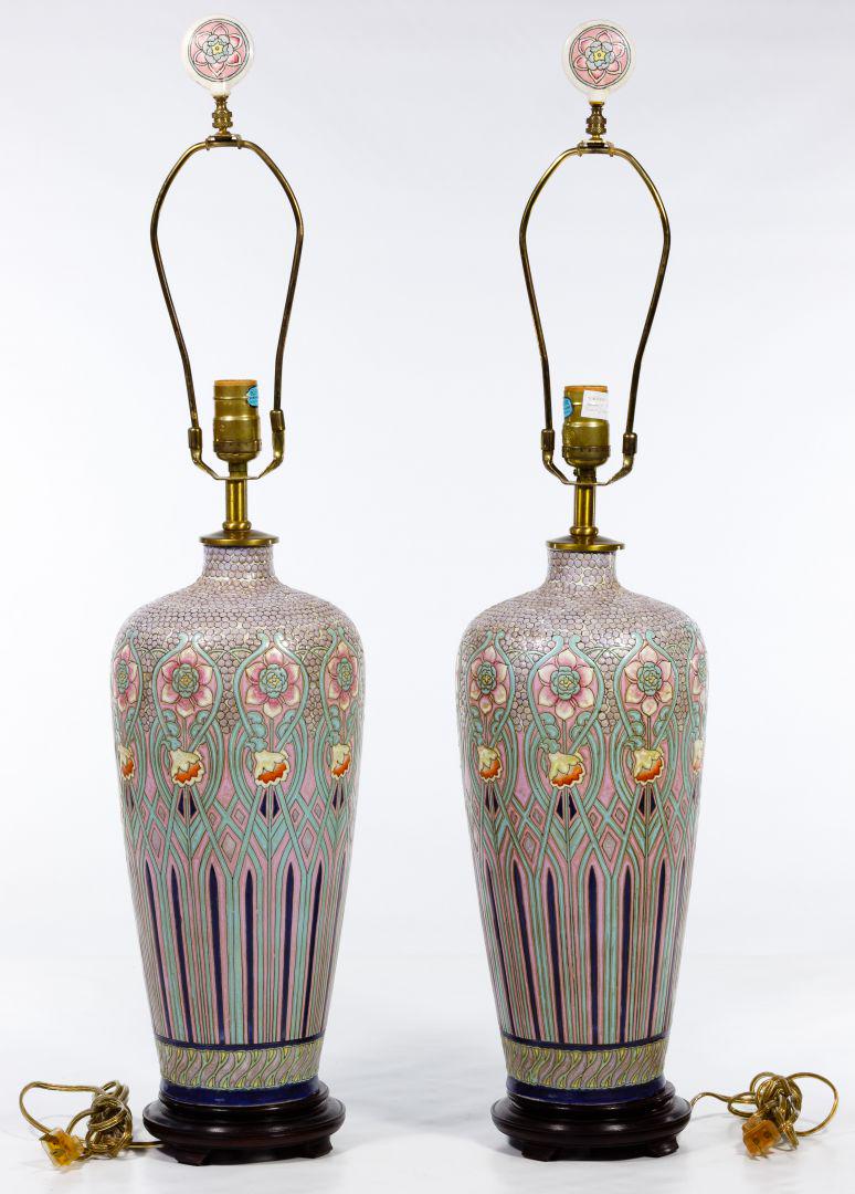 Maitland-Smith Ceramic Art Nouveau Style Lamps: Maitland-Smith Ceramic Art Nouveau Style Lamps Pair having repeating floral pattern, matching finials, mounted on wood base Condition: Very Good, overall light wear consistent with age and normal use;