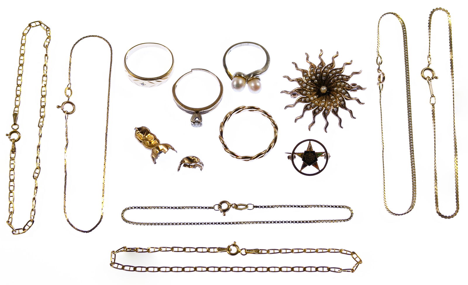 14k Gold Jewelry Assortment: 14k Gold Jewelry Assortment Including a white gold and pearl ring, a twisted band ring, two rings having very small round cut diamonds, a Masonic pin, a seed pearl pin, six chain bracelets as well as