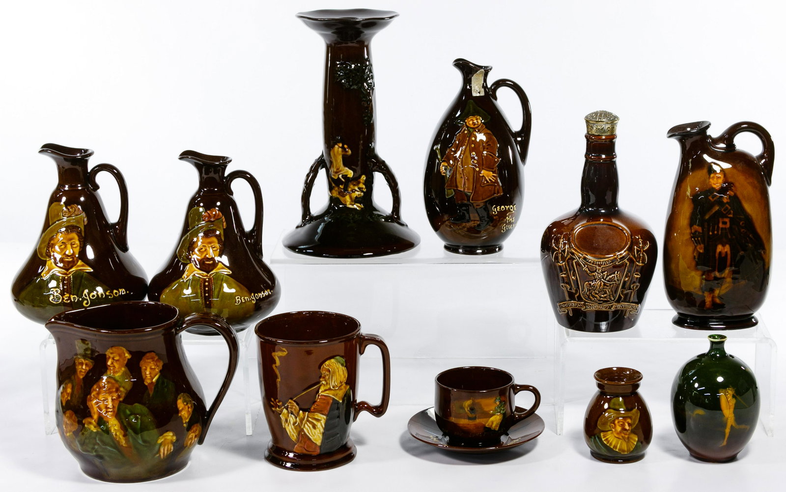 Royal Doulton King's Ware Assortment: Royal Doulton King's Ware Assortment Twelve items with 1902-1922 mark including a large hunt scene candlestick, a Dewar's Whiskey 'George the Guard' pitcher, a Chivas Regal bottle with original metal 