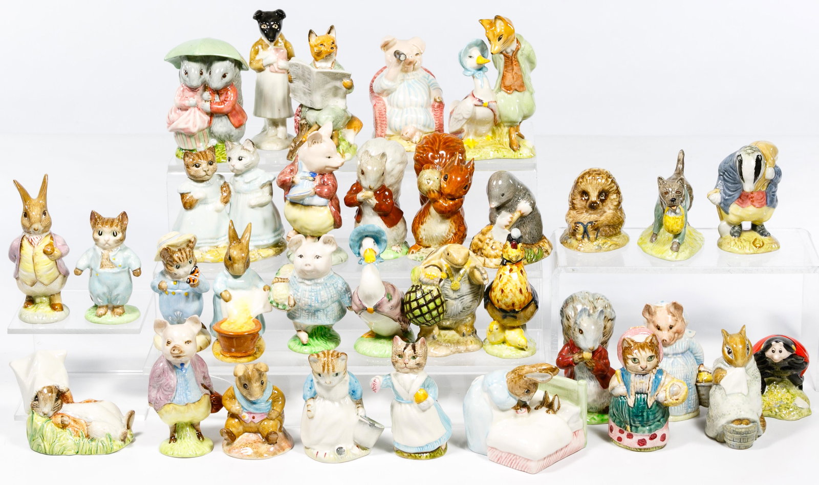 Beatrix Potter Figurine Assortment: Beatrix Potter Figurine Assortment Forty-one items including thirty-two 'Beswick' examples #30 'Tommy Tiptoes', #67 'Tabitha Twitchett', #90 'Benjamin Bunny', #6 'Sally Henny Penny', #40 'Tom Kitten',
