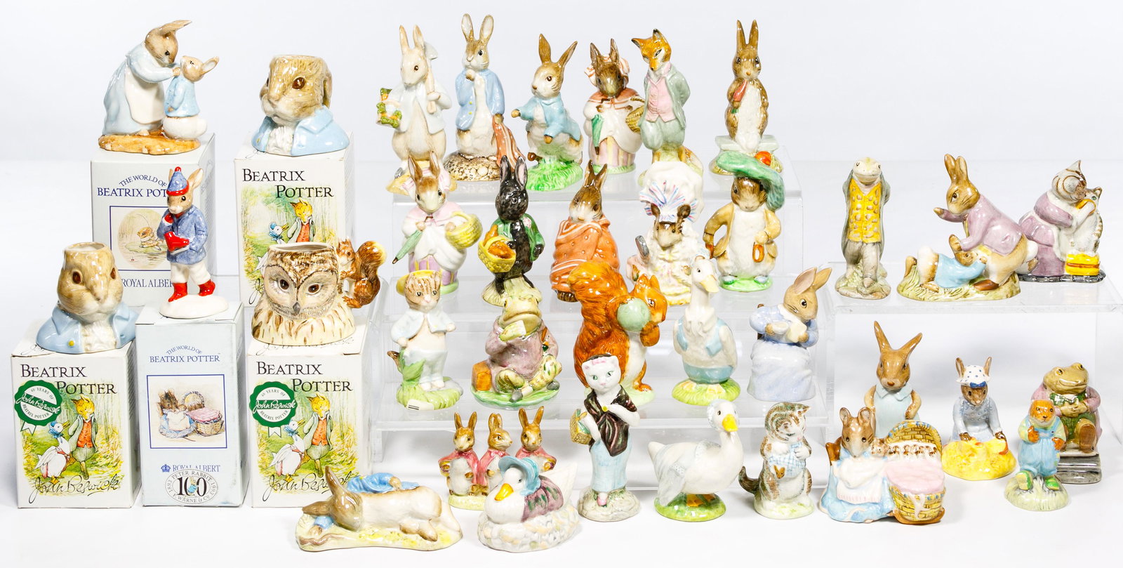 Beatrix Potter Figurine Assortment: Beatrix Potter Figurine Assortment Thirty-five items including thirty-one 'Besick' figurines examples of #55 'Little Black Rabbit', #46 'Peter Rabbit', #68 'Old Peter Brown', #46 'Lady Mouse', 'Hunca