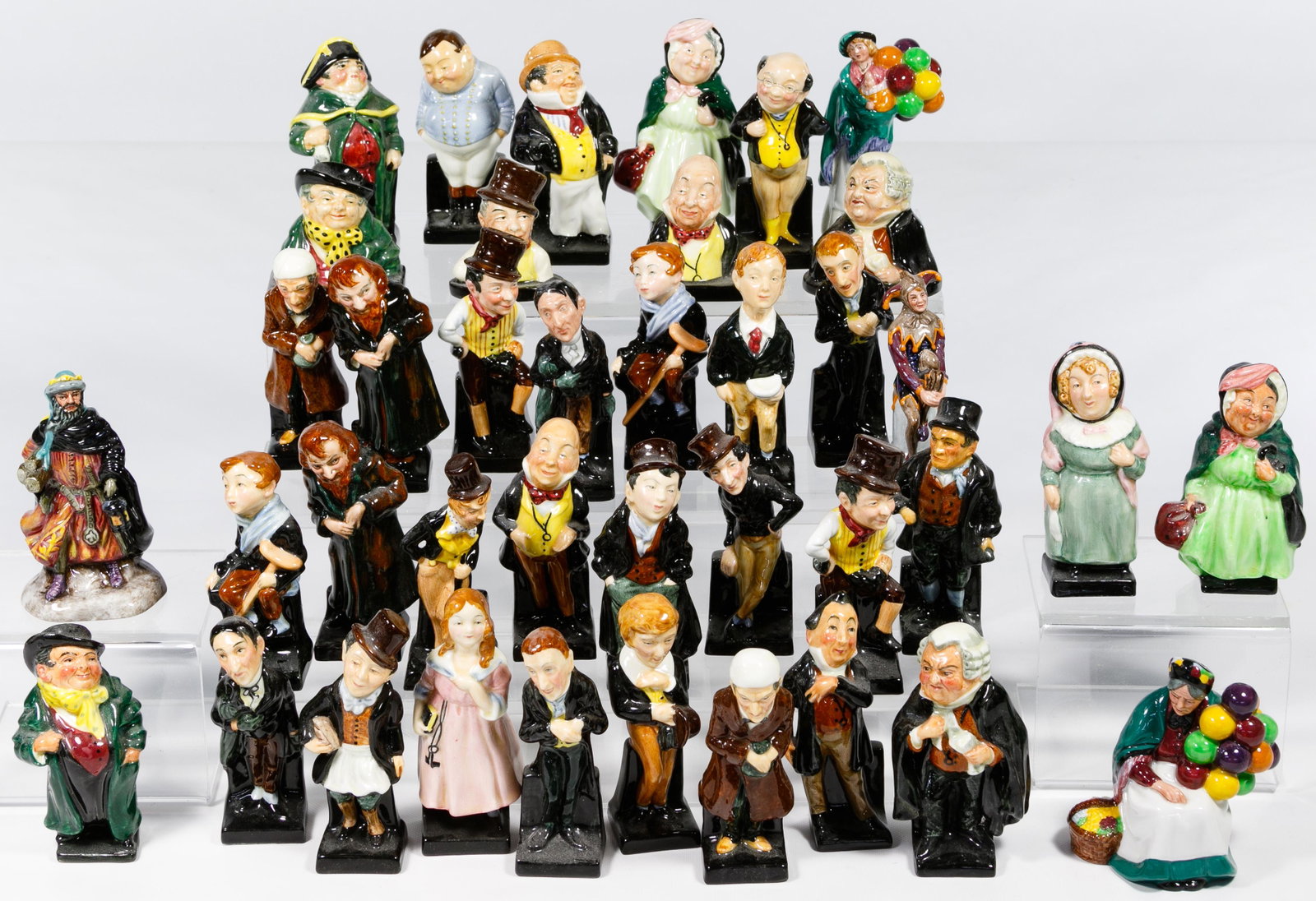 Royal Doulton Figurine Assortment: Royal Doulton Figurine Assortment Forty-three small figurines including examples of 'Stiggens', 'Bumble', 'Sairy Gamp', 'Sam Weller', 'Fagin', 'Uriah Heep', 'David Copperfield', 'Fat Boy', 'The Old Ba