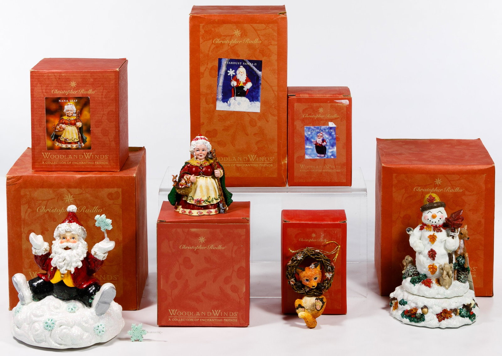 Christopher Radko Christmas Ornament Assortment: Christopher Radko Christmas Ornament Assortment Seven items from the Woodland Winds collection including three music boxes two ' Stardust Santa' a 'Carlton the Snowman' , four ornaments, two 'Nana Lea