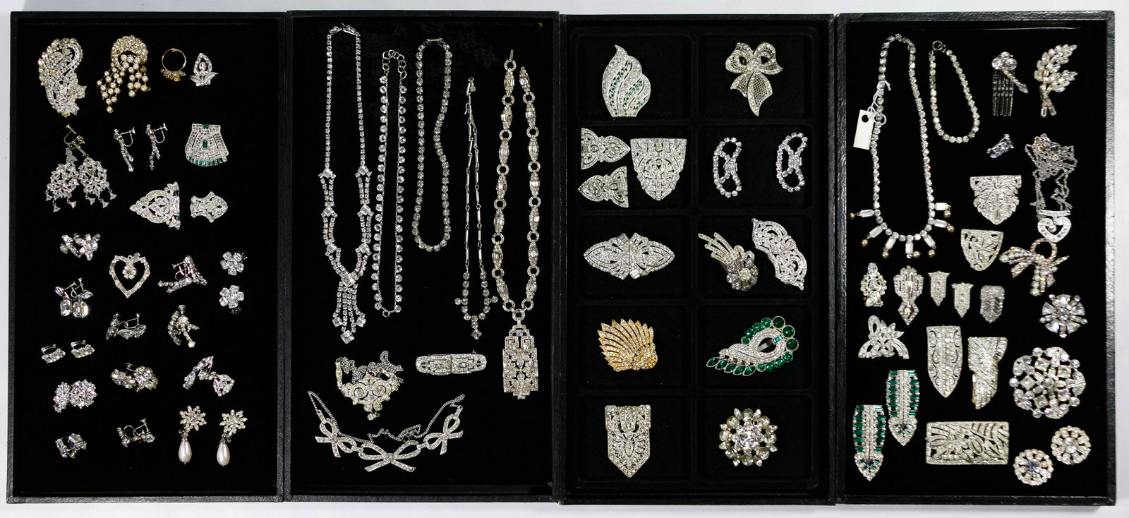 Rhinestone Jewelry Assortment: Rhinestone Jewelry Assortment Including a sterling silver necklace as well as earrings, coat pins, bracelets, rings and shoe clips, some with colored stones; signed examples including Hattie Carnegie 