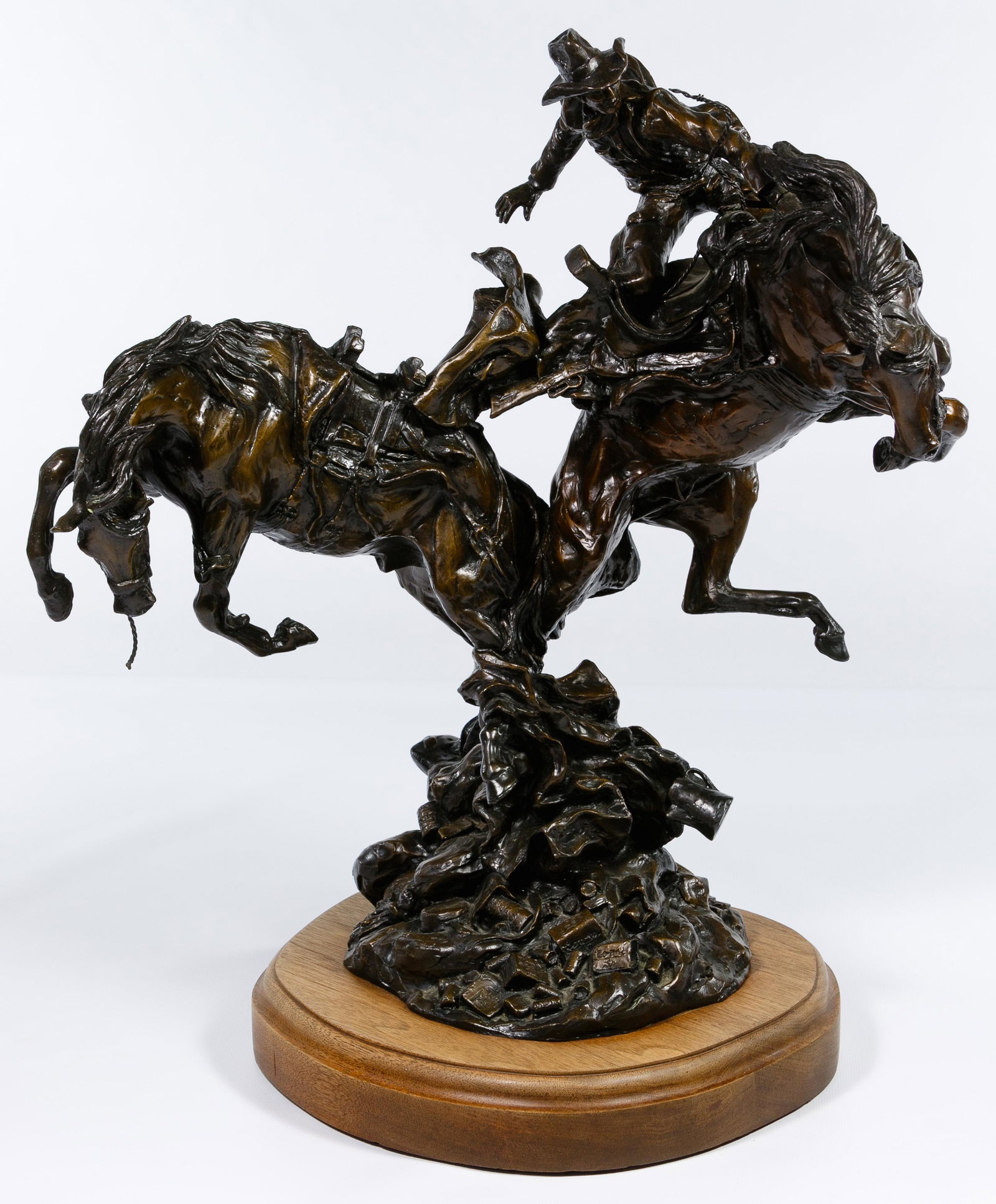 Ken Payne (American, 1938-2012) Bronze Statue: Ken Payne (American, 1938-2012) Bronze Statue 1985, signed lower left under riderless horse, numbered AP/40 to the left of signature; titled 'Pack Horse Polka'; mounted on a wood base having a built-i