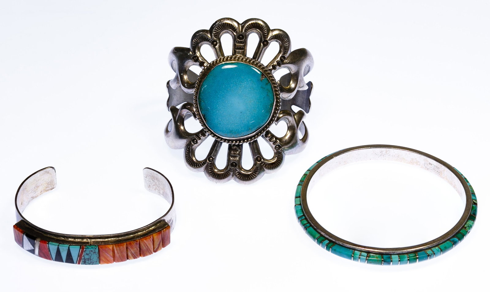 Native American Signed Sterling Silver Bracelet: Native American Signed Sterling Silver Bracelet Assortment Three bracelets by Wilson Begay sand cast cuff having a round cut cabochon turquoise, Randy Boyd bangle having pieced turquoise and Lo Lo cuf