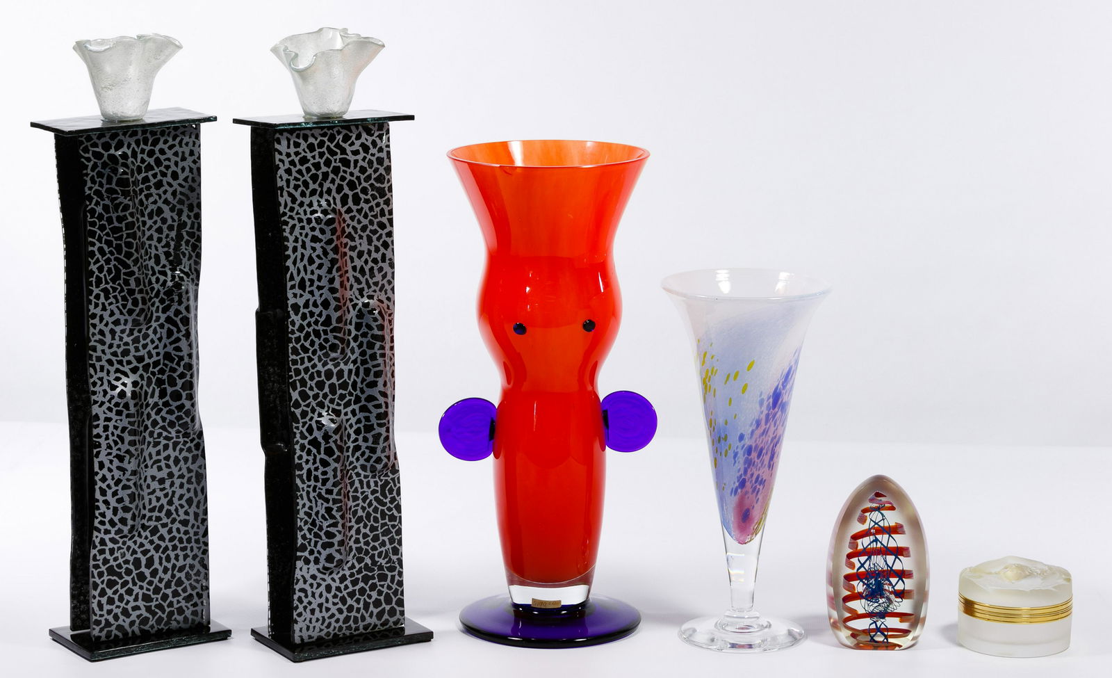 Art Glass Assortment: Art Glass Assortment Six items including a Lalique 'Daphne' trinket box etch signed on underside, an orange vase etched on the underside, footed yellow vase, a red, white and blue paperweight etched o