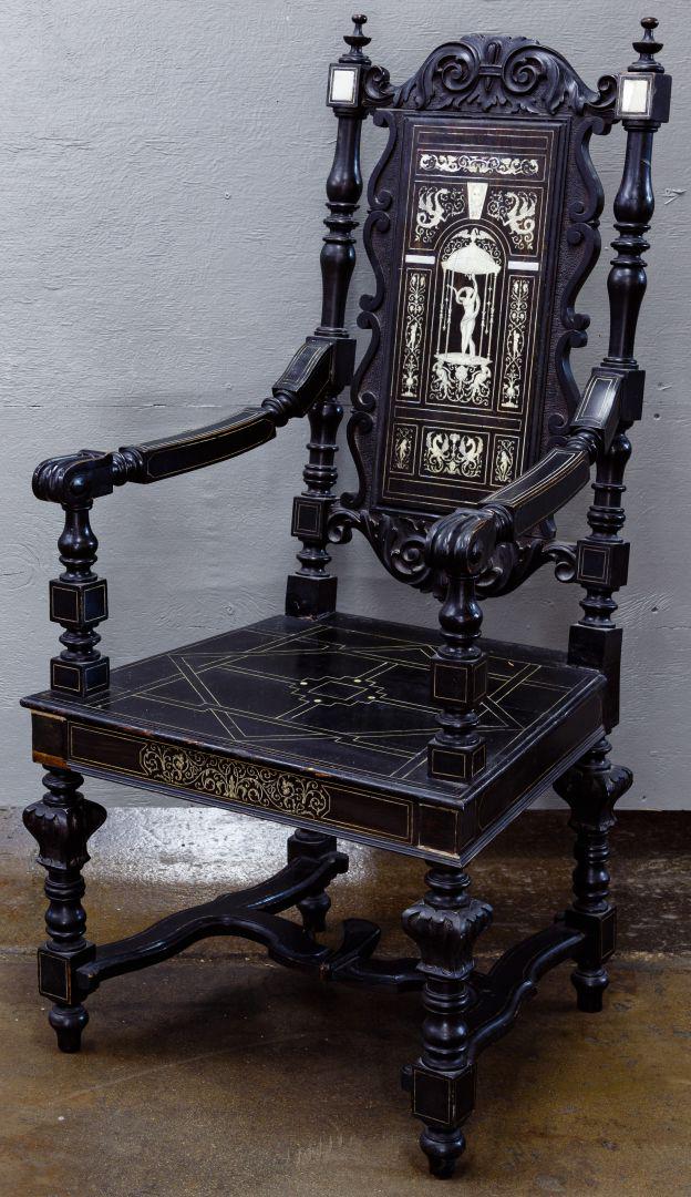 Italian Renaissance Style High Back Armchair: Italian Renaissance Style High Back Armchair Ebonized, heavily carved arm chair with string inlays of bone across seat and arms, back splat having elaborate inlay of scratch carved bone images of drag