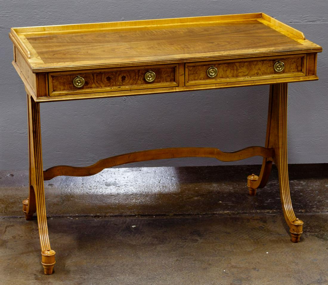 Baker English Regency Sofa Table: Baker English Regency Sofa Table Historic reproduction Regency style sofa table in two tones of mahogany, elm and burlwood veneer, having two drawers, reeded legs, curved stretcher bar Condition: Very
