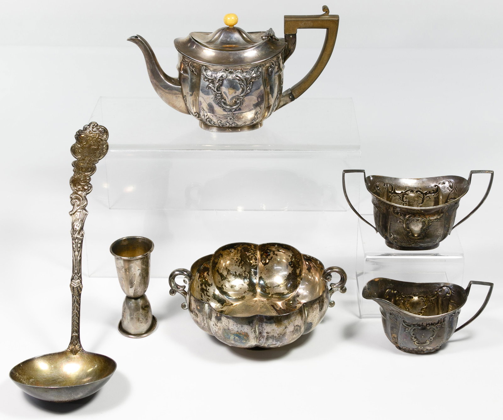 Sterling Silver Serving Assortment: Sterling Silver Serving Assortment Six items including an ornate punch ladle by Gorham, a two handle bowl marked 'Sanborn' and 'Mexico', a jigger and a three piece set of teapot, sugar and creamer hav