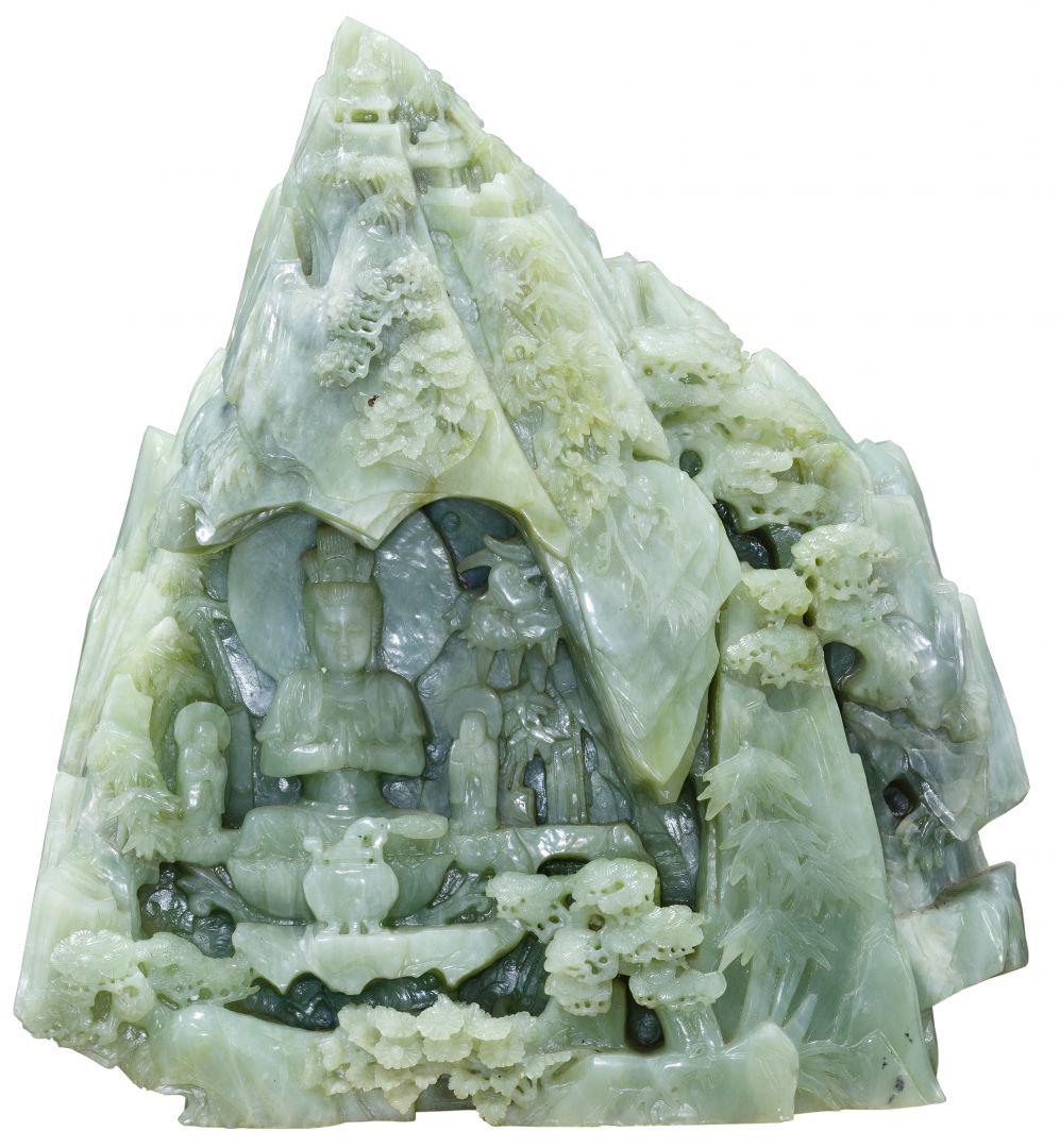 Chinese Carved Jadeite Jade Mountain Statue: Chinese Carved Jadeite Jade Mountain Statue Pale green jadeite jade carving of a mountain, having a grotto in which sits Buddha and attendants Condition: Very Good, several small chips throughout; ove