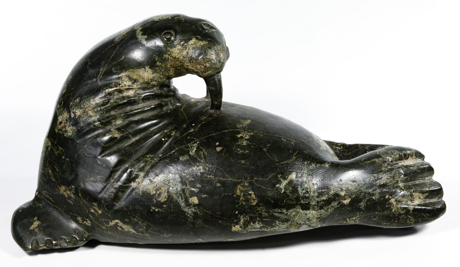 Canadian Carved Soapstone Walrus: Canadian Carved Soapstone Walrus Undated, carved sculpture Condition: Very Good, no damage noted Height: 9.00 inches, Width: 17.00 inches, Depth: 8.00 inches Category: Decorative Arts > Ethnographic S