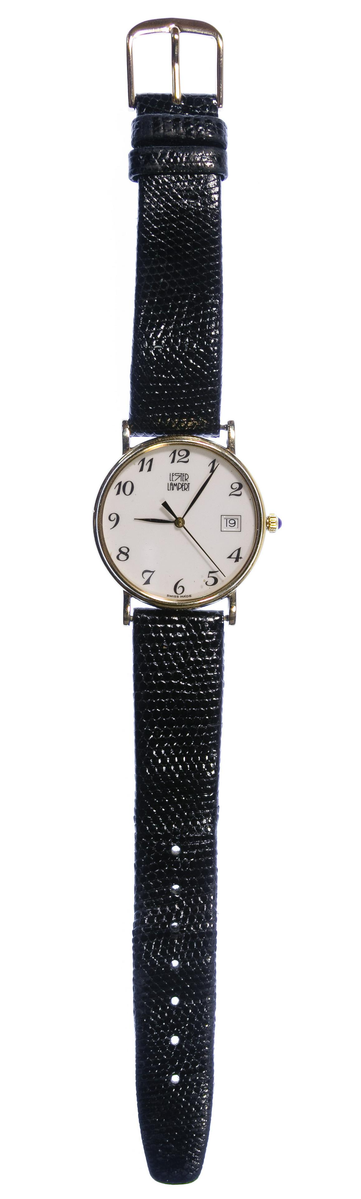 Lester Lampert 14k Gold Case Wrist Watch: Lester Lampert 14k Gold Case Wrist Watch Having a Swiss movement mounted on a leather band; marked '14k' on back of case Condition: Good, overall moderate wear; not running; accuracy and longevity unk
