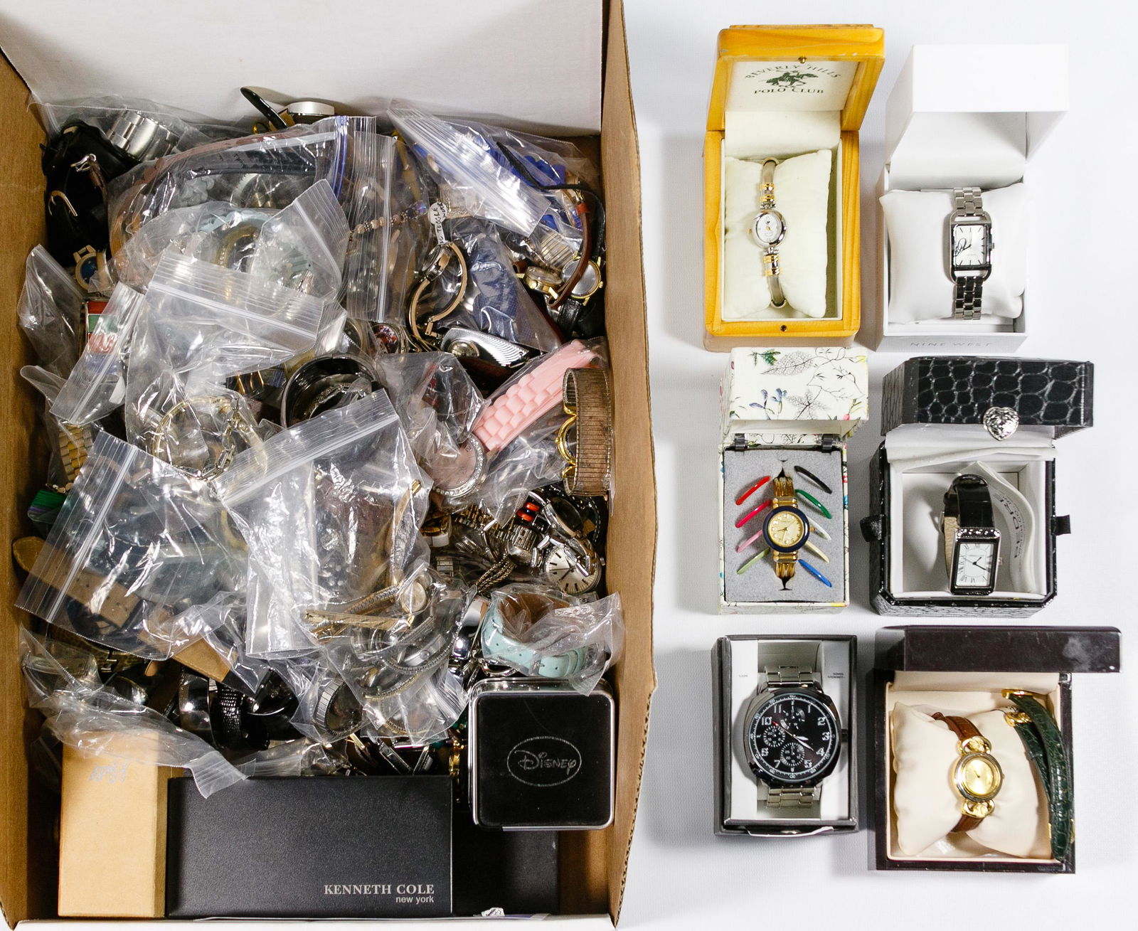 Wrist Watch Assortment: Wrist Watch Assortment One-hundred seventy items including Kenneth Cole, Guess, Gucci, Anne Klein, J. Jill, vintage Elgin, Disney, Fossil, Nine West, Beverly Hills Polo Club, several new, some still i