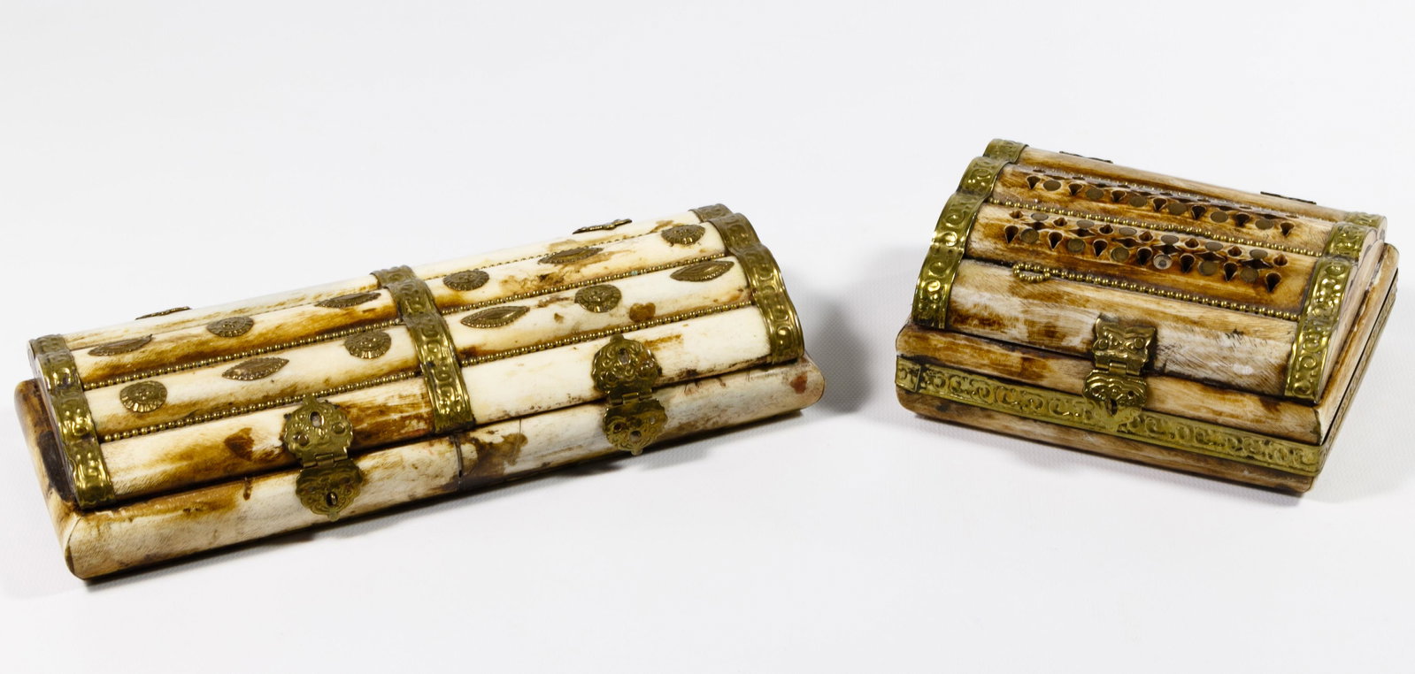 Tibetan Bone and Brass Boxes: Tibetan Bone and Brass Boxes Two boxes constructed from bone and having brass hardware and ornamentation with middle eastern styling Condition: Very Good to Good, overall light wear consistent with ag